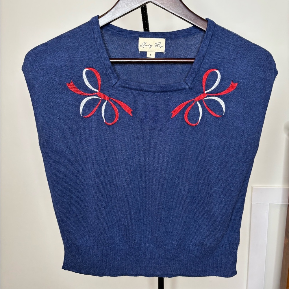 Lindy Bop Women's Blue Top with Red and White Bow Details
